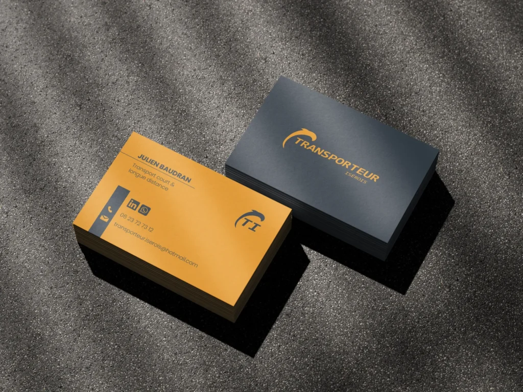 Deux cartes de visite, une jaune et une anthracite, avec logo et informations de contact pour 'Transporteur', Julien Baudran.