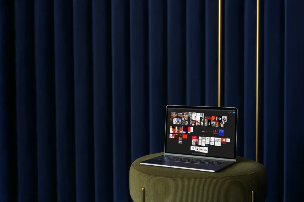 Un ordinateur portable présentant la direction artistique d'un projet de conception d'identité visuelle