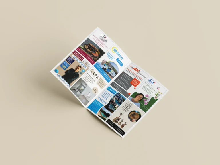Brochure dépliée présentant diverses publicités : panneaux solaires, services automobiles, assurances, décoration intérieure, bien-être.